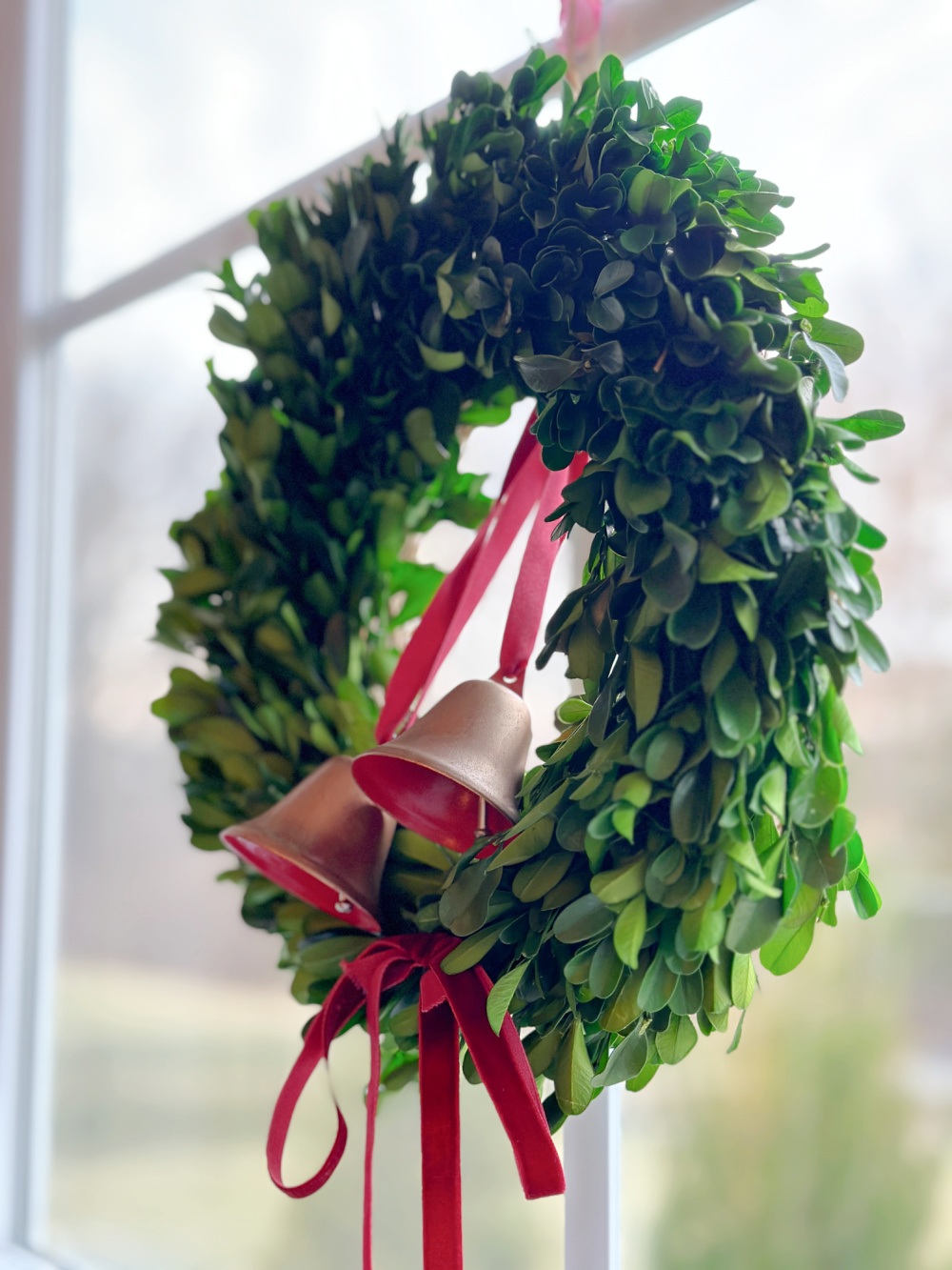 small boxwood wreath with bells